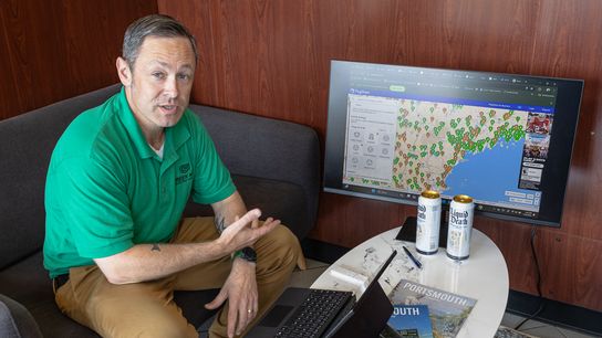 Jesse Lore shows the numerous public charging options in the area